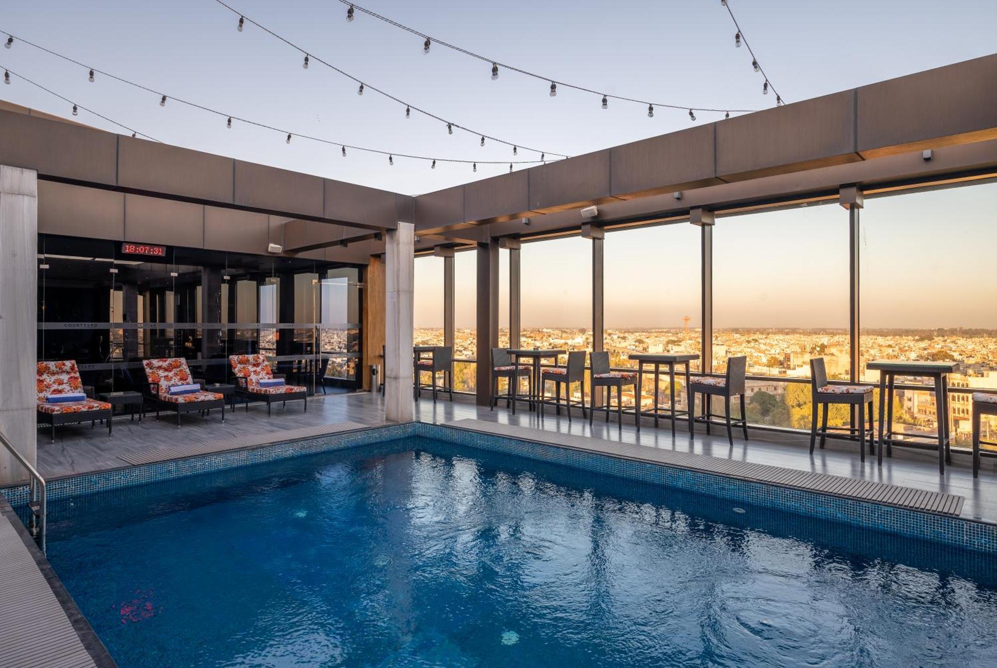 Courtyard By Marriott Amritsar Hotel Exterior photo The rooftop pool at the Hilton Athens